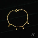 Shiny 18k gold balls bracelet for kids with dangling charms