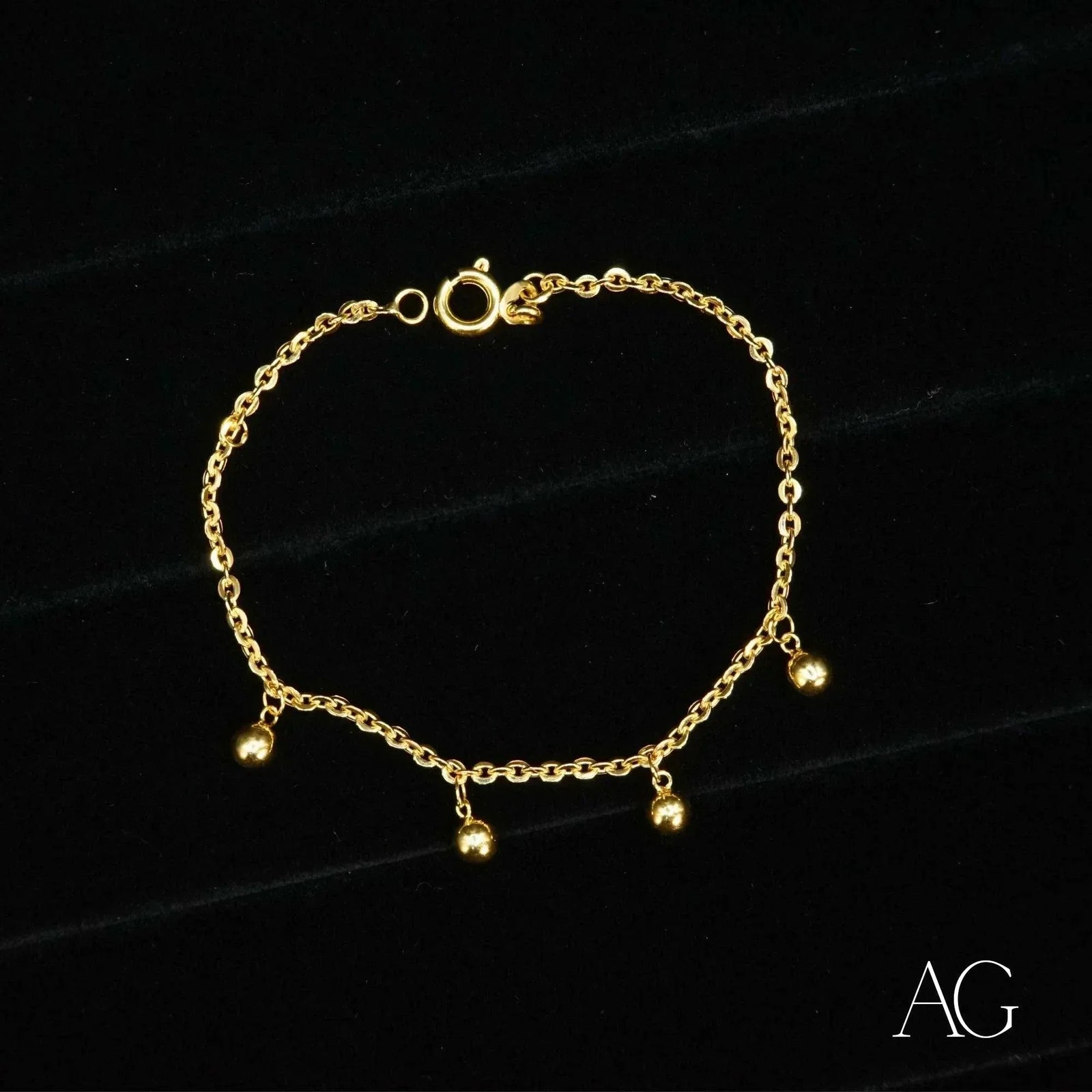Shiny 18k gold balls bracelet for kids with dangling charms