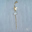 Gold-toned 18k gold bellybutton piercing with butterfly charm and cubic zirconia in Greater Boston Area
