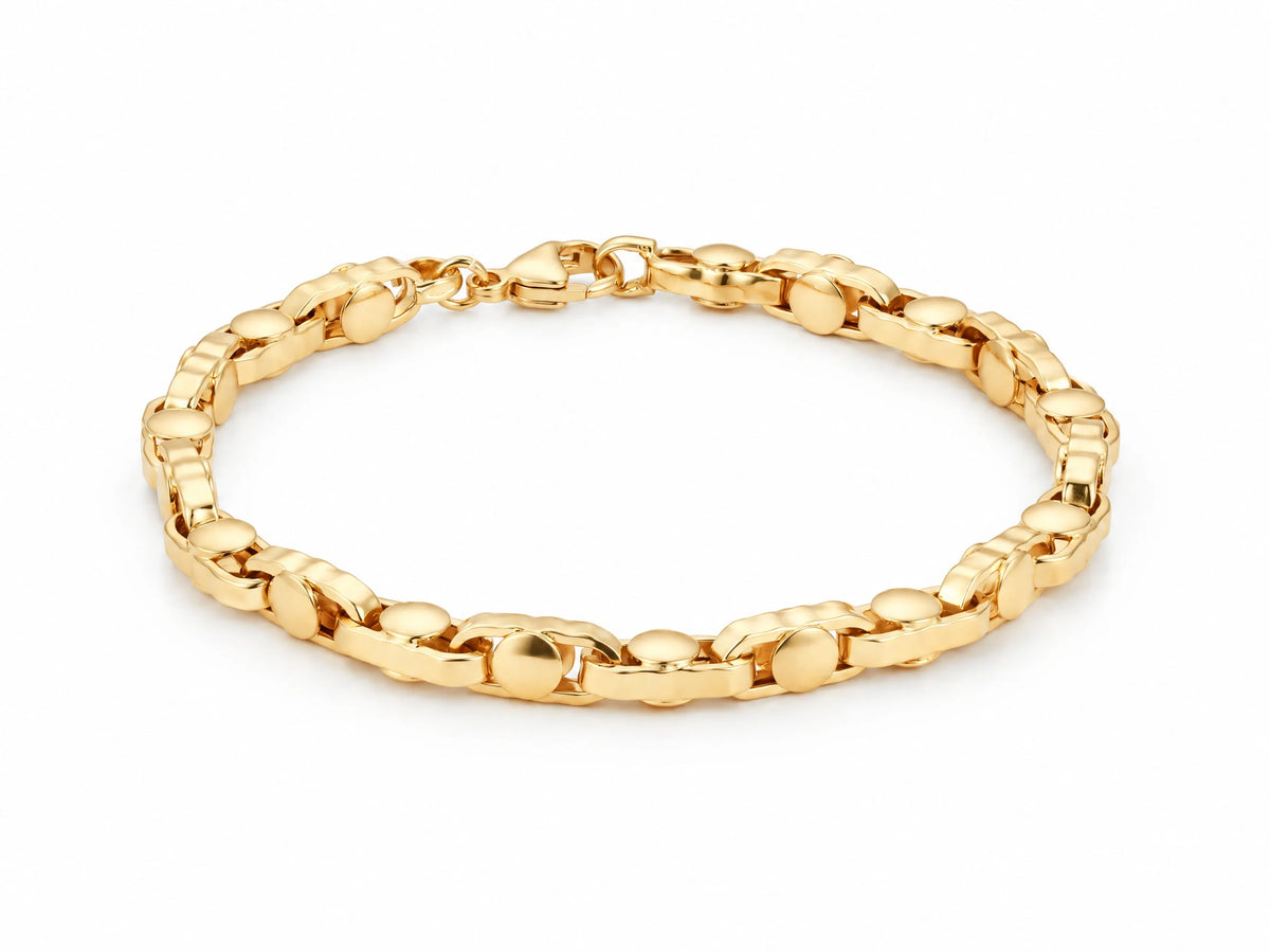 18K yellow gold bracelet with alternating wide rounded and narrow connector links, laid flat on a white background