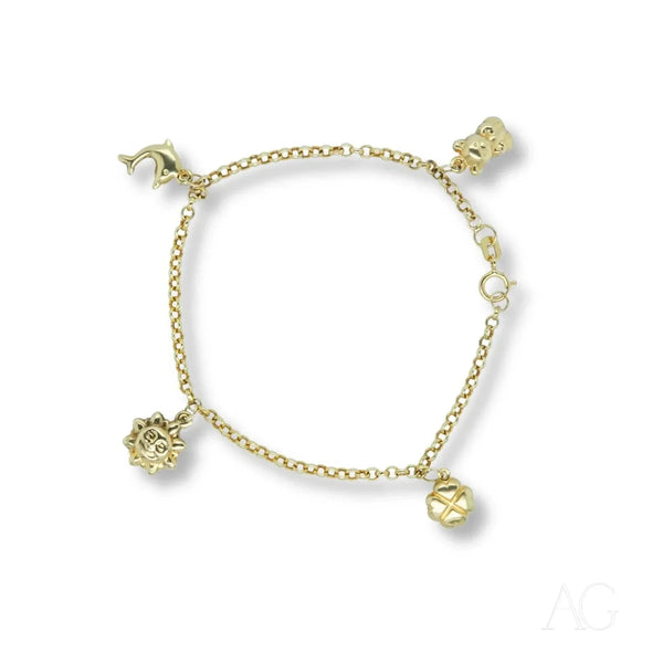 18k gold charm bracelet for kids with dolphin, teddy bear, sun, and clover charms