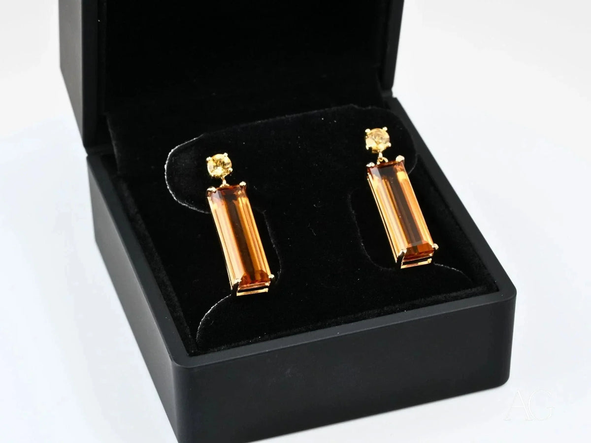 18k yellow gold drop earrings with citrine gems in black box