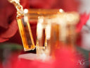 18K gold citrine pendant with rectangular orange gemstone from Solar Aura Collection