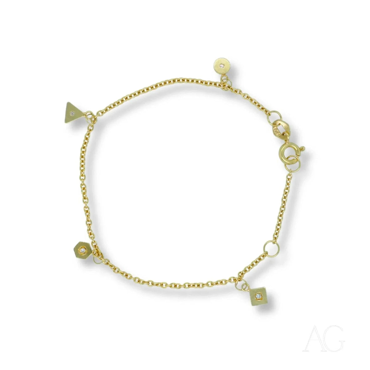 18K gold bracelet with geometric triangle, hexagon, square and disc charms with clear stones, lobster clasp, white background