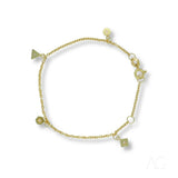 18K gold bracelet with geometric triangle, hexagon, square and disc charms with clear stones, lobster clasp, white background
