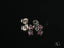 Silver stud earrings with purple gemstones from luminous spark art gold jewelry collection