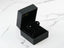 Open black jewelry box with pink stud earrings showcasing luminous spark and certified 18k solid gold jewelry