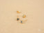 Elegant 18K gold blue stud earrings with light blue gemstones from Celestial Spark
