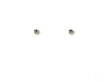 Pair of 18K gold stud earrings with blue stones on white background