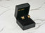 18K gold multicolor butterfly earrings with colorful gemstones in a black velvet box