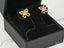 18K gold multicolor CZ butterfly earrings displayed in a black jewelry box