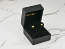 Solid 18k gold bow earrings in black velvet box