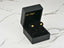 Gold bow earrings in black velvet box, crafted from solid 18K gold, part of art gold jewelry