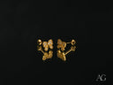 Pair of solid 18k gold bow earrings with pavé CZ diamonds