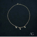 Captivating 18k gold heart charm anklet with silver chain and three hearts