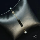 18k gold ID bracelet with pearl, diamond flower charm