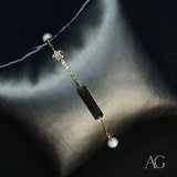 18k gold ID bracelet with pearl, diamond flower charm