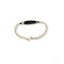Gold oval link chain bracelet with black and gold ID plate, luxurious 18k gold for child’s 18k gold jewelry