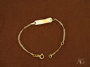 18k gold kid’s ID bracelet with complimentary engraving and spring ring lock