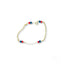 Delicate 18k gold kids’ bracelet featuring black coral and heart symbol beads