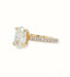 18k Gold Oval Diamond Engagement Ring featuring a natural oval diamond and pavé band