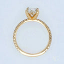 18k gold oval diamond engagement ring with round brilliant center stone