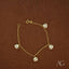 18k gold bracelet featuring soccer ball charms and a gold panda design