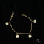 18k gold panda bracelet featuring a gold chain with skull-shaped charms