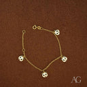 18k gold panda bracelet with five black and white panda motif charms