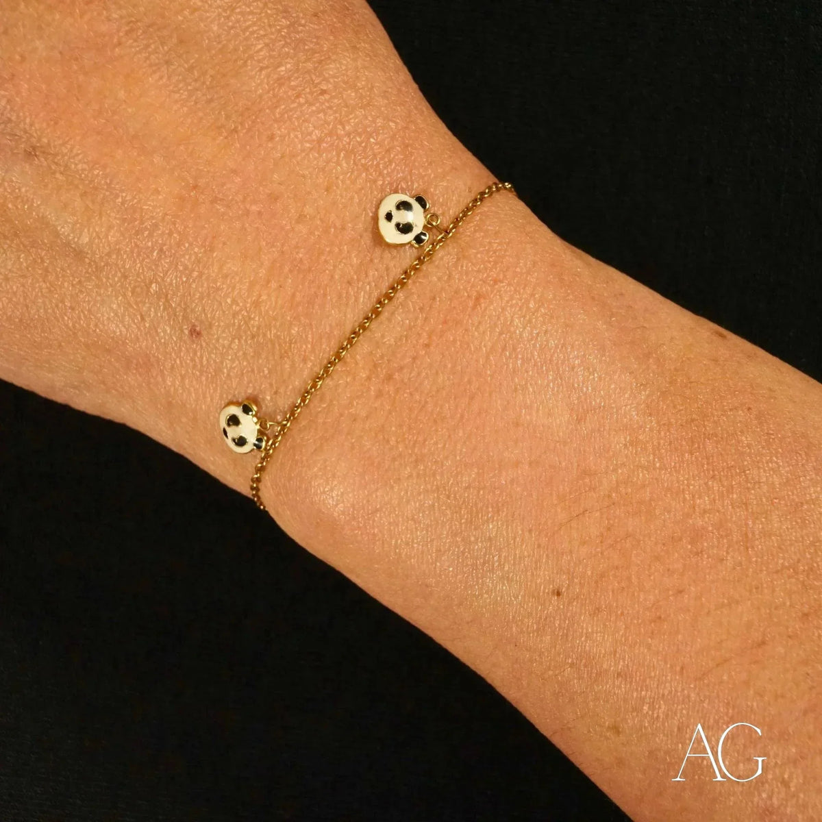 18k gold panda bracelet with two panda motif charms