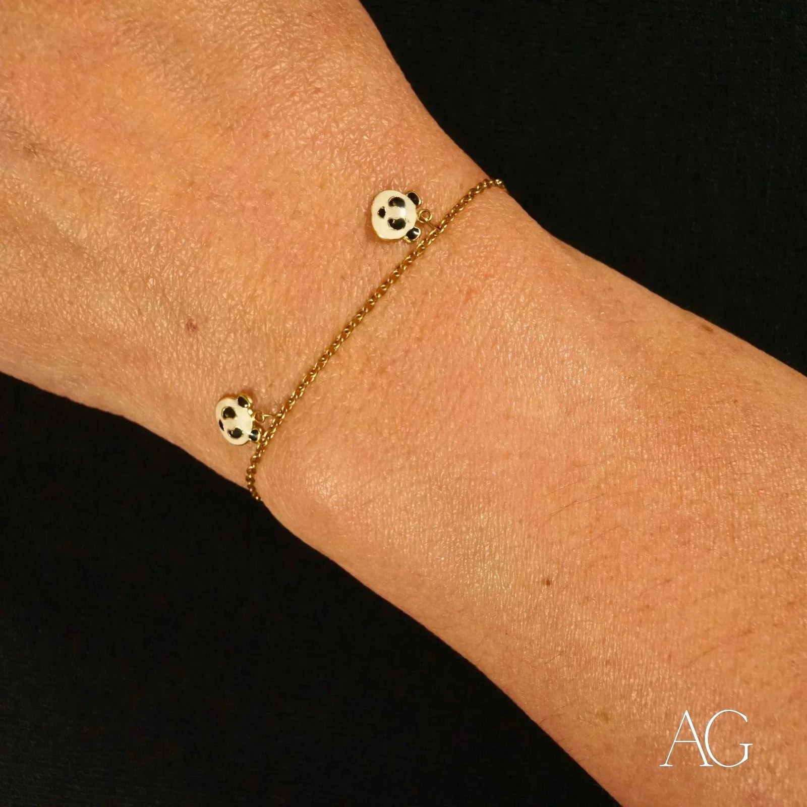 18k gold panda bracelet with two panda motif charms