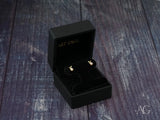 18K gold pearl stud earrings with rabbit design in black box