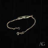 Shiny 18k gold personalized ID bracelet for kids with Figaro chain