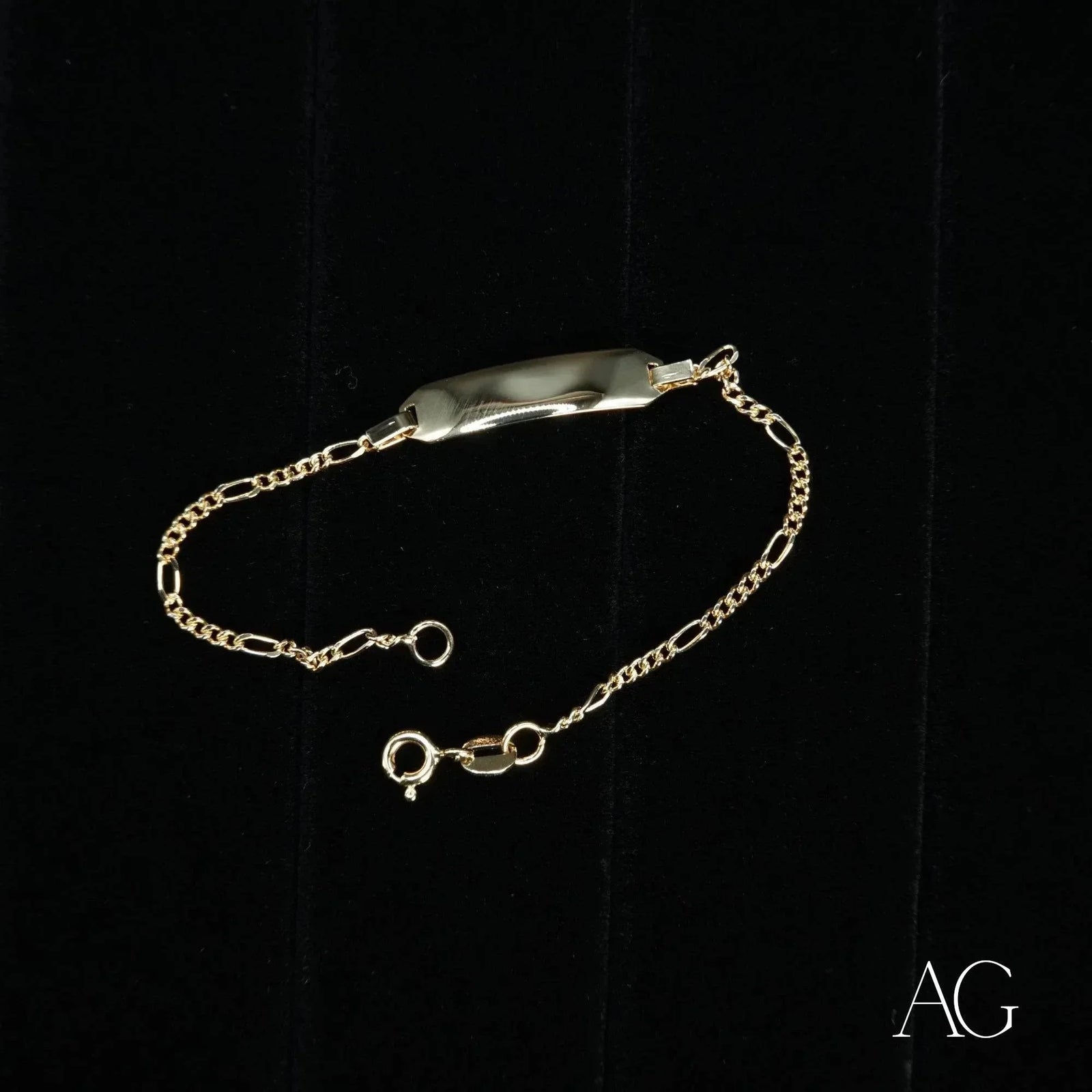 Shiny 18k gold personalized ID bracelet for kids with Figaro chain
