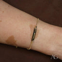 Child’s 18k gold personalized ID bracelet with brown rectangular stone