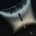 Child’s 18k gold personalized ID bracelet with delicate chain and bar charm