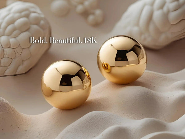 18k gold polished sphere earrings.