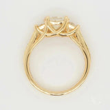 18k gold three-stone ring with 0.98ct round diamonds brilliance redefined