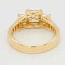 18k gold ring with 0.98ct diamond: square-cut center and rectangular side stones