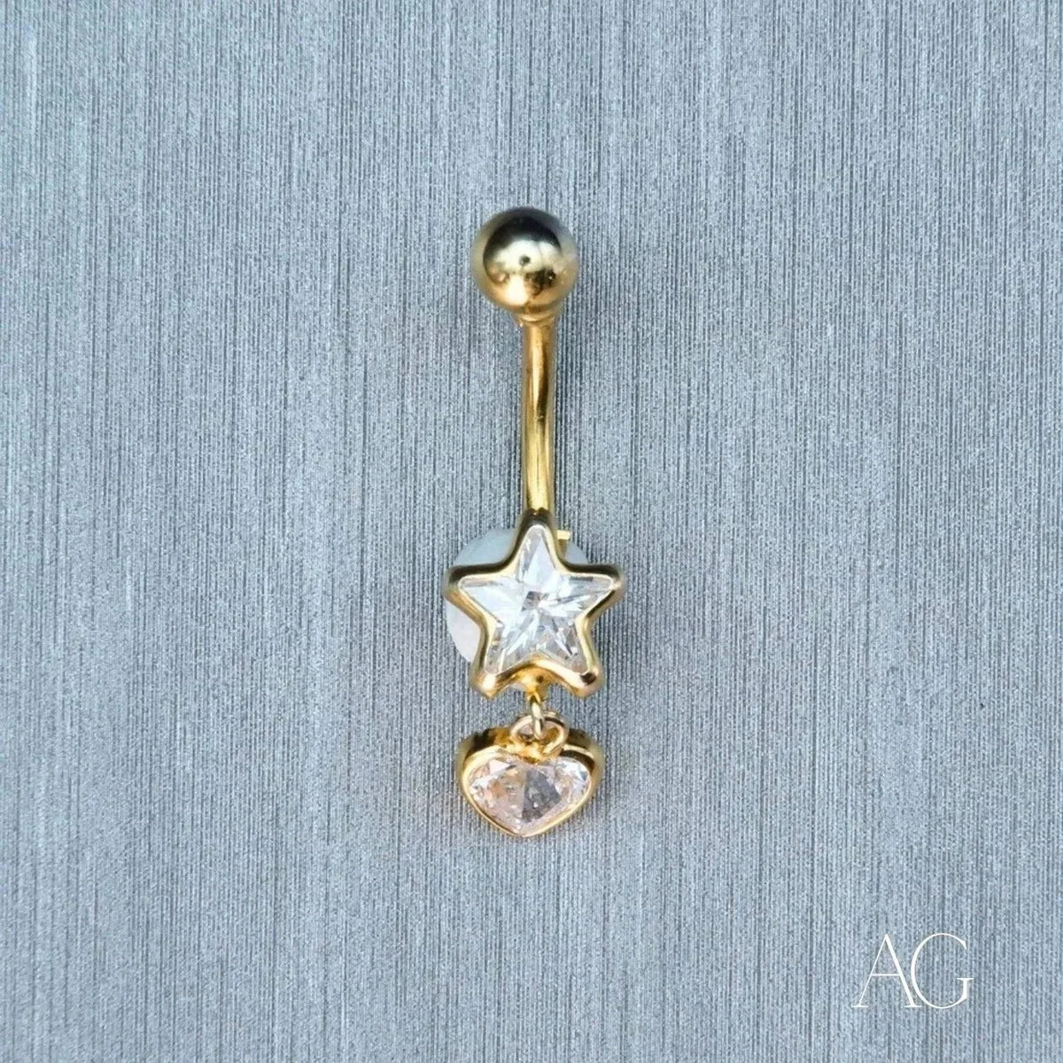 18k gold bellybutton piercing with star and heart gems
