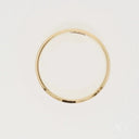 Shiny 18k solid gold wedding band with modern elegance