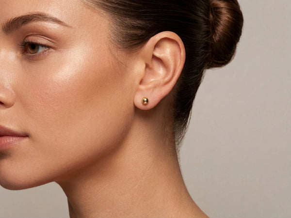 18k gold ball stud earring in gold-toned sphere, art gold jewelry