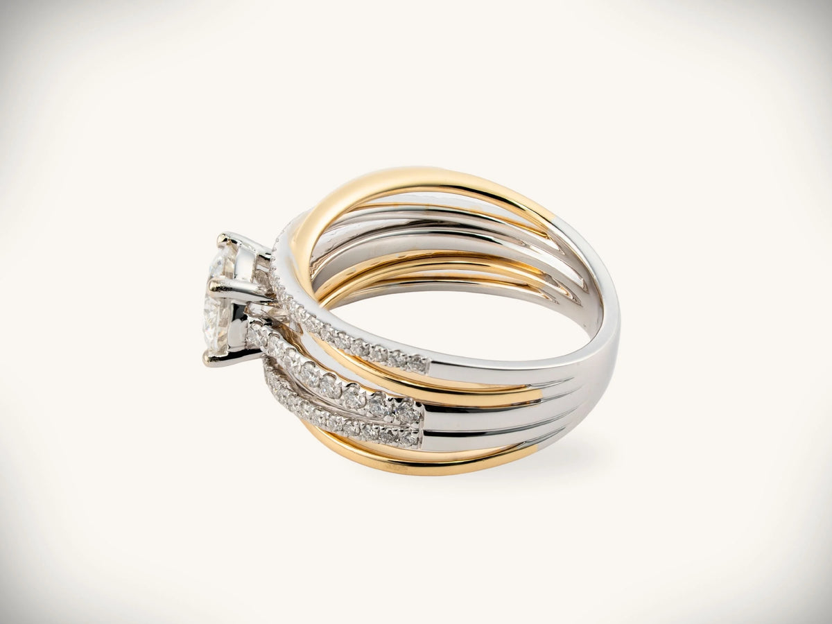 18K two-tone gold engagement ring with diamond center, profile angle view