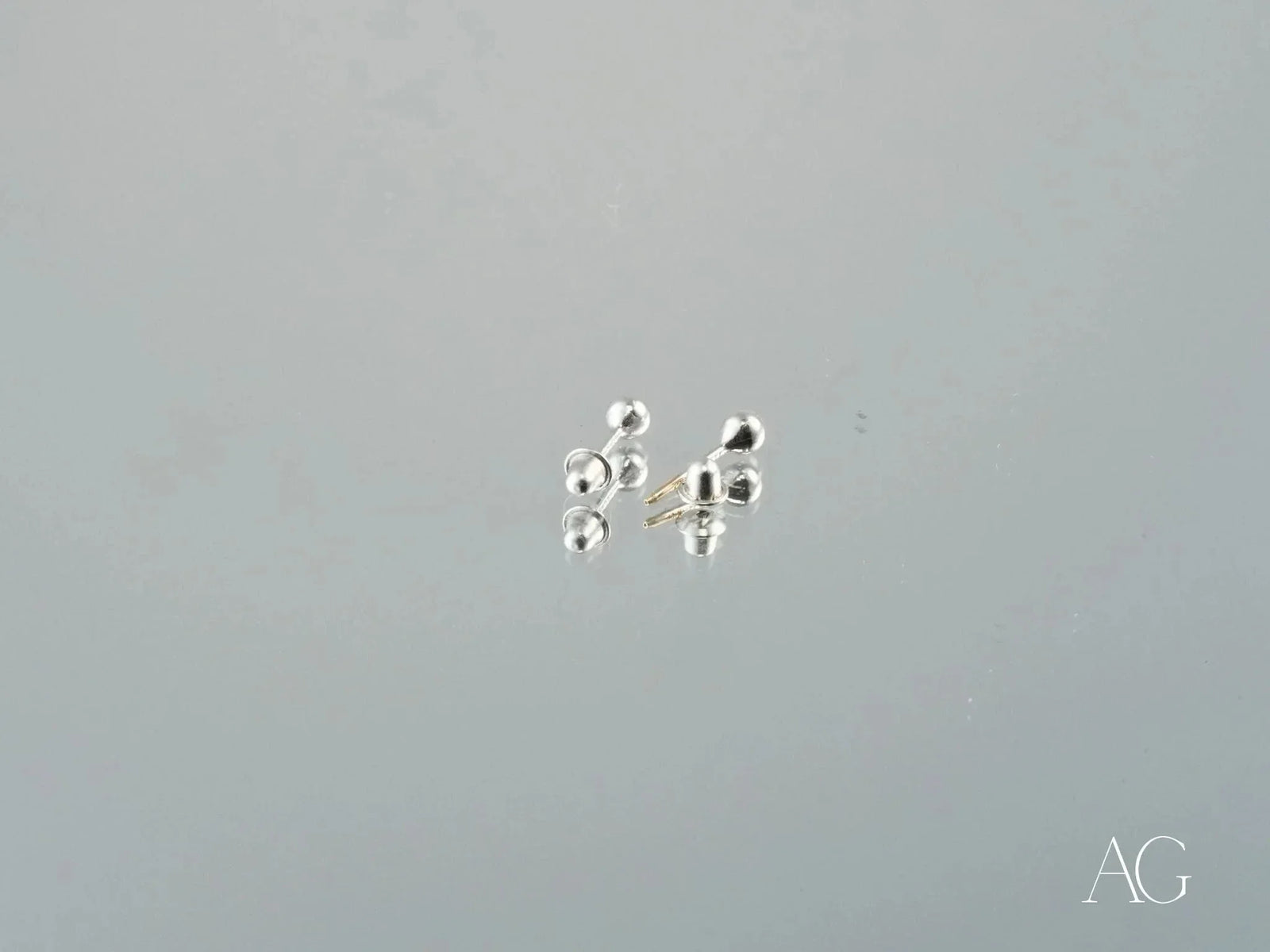 Several certified 18k solid white gold 3mm ball stud earrings