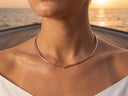 18K white gold choker necklace with sleek minimalist curve