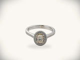 18k white gold diamond engagement ring with 0.5ct oval halo pavé band