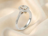 18k white gold 0.5ct oval diamond halo engagement ring