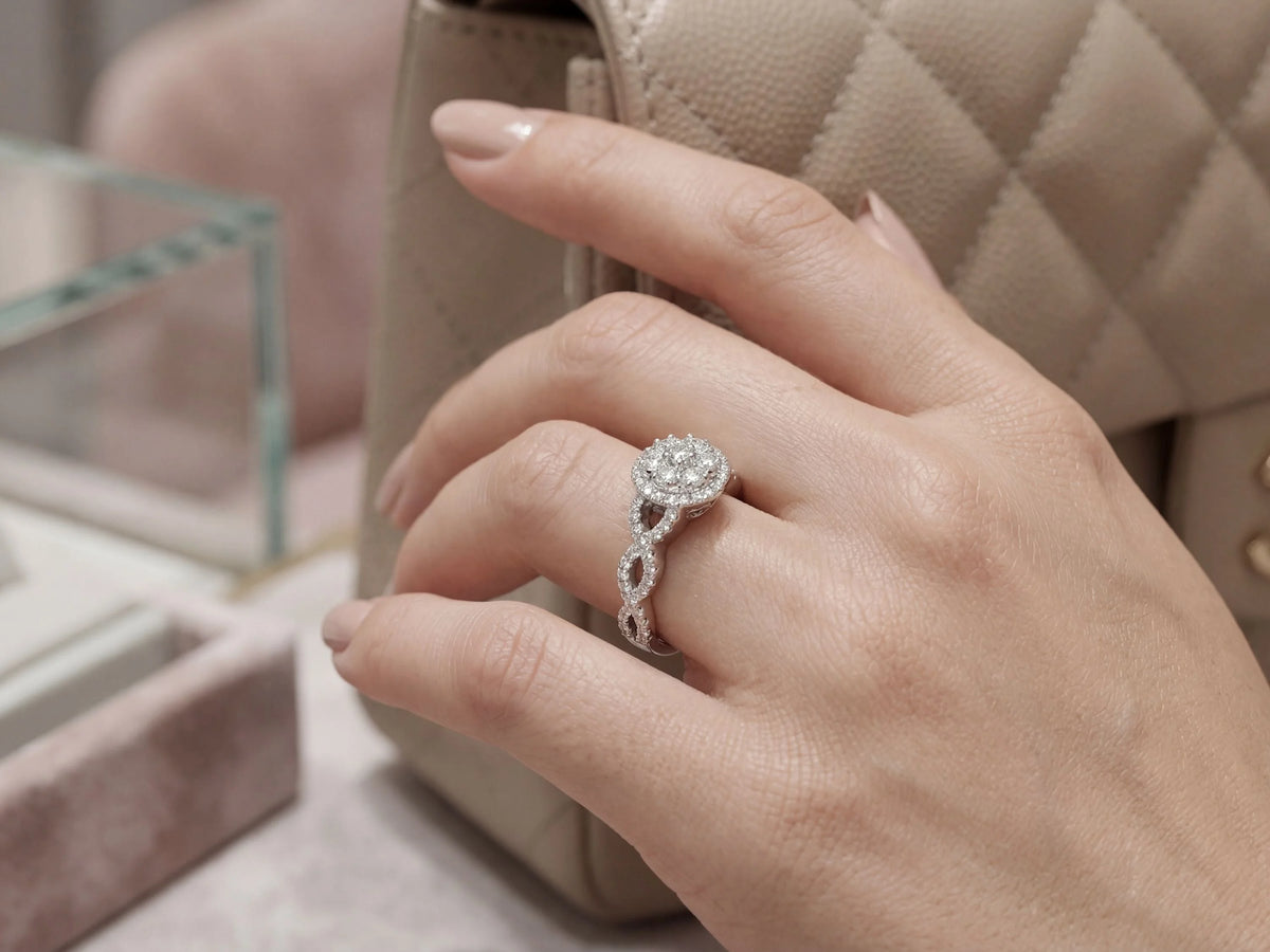 18k white gold diamond engagement ring 0.82ct halo twisted band