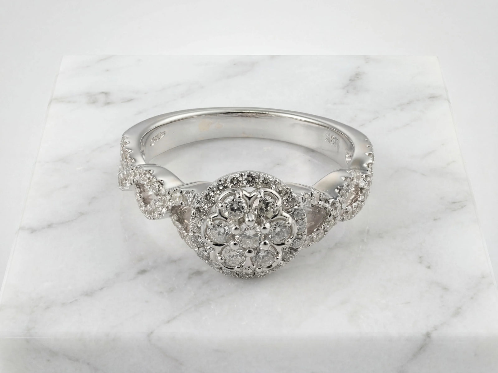 18k white gold diamond ring 0.82ct with sparkling floral cluster design