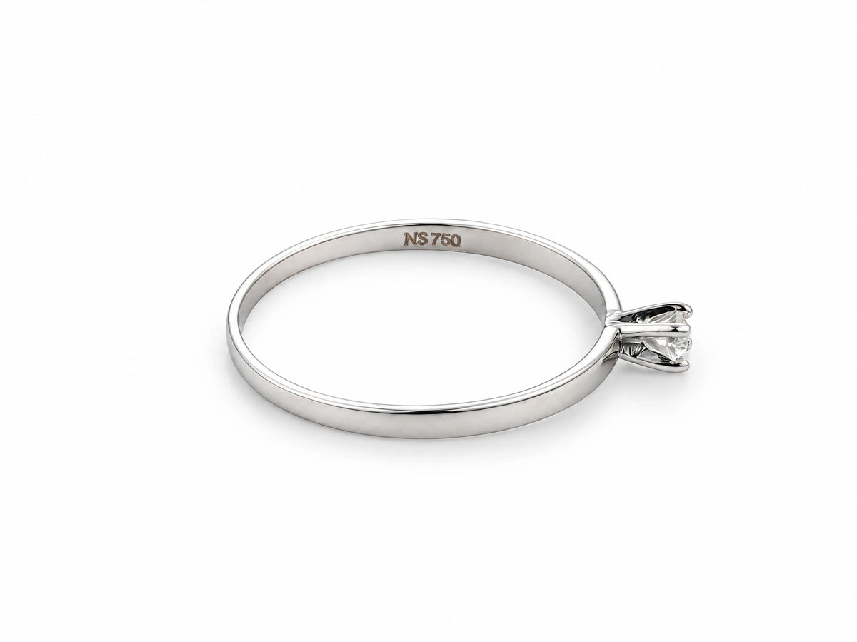 18K white gold diamond solitaire ring, side profile of the band and prong setting